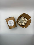 Cardboard packaging with a product inside on a white background
