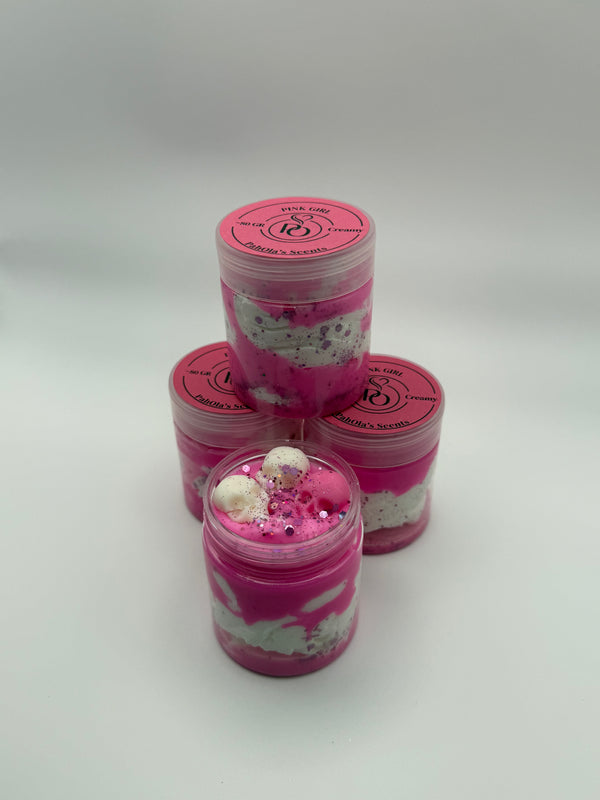 Three pink and white containers with decorative elements on a light gray background